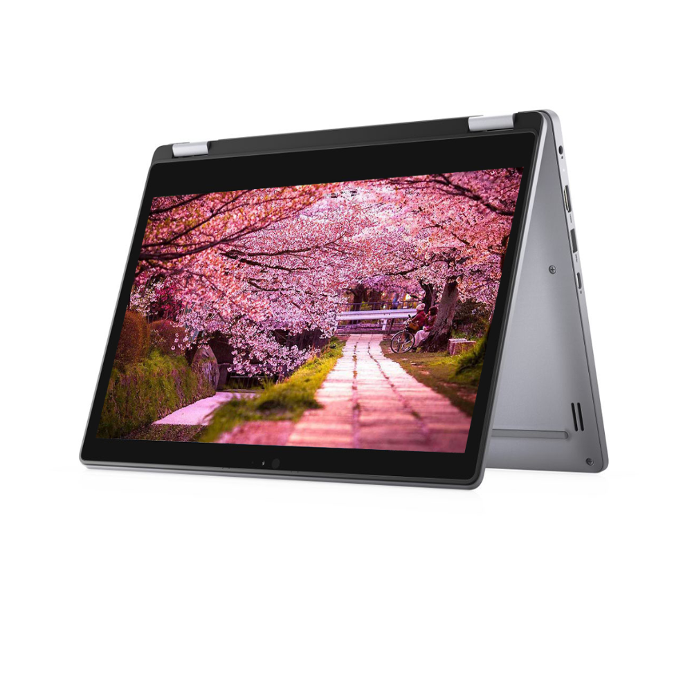 A silver convertible tablet shown open in a laptop-style configuration, with a screen displaying a cherry blossom pathway scene. The product is photographed on a clean white background.